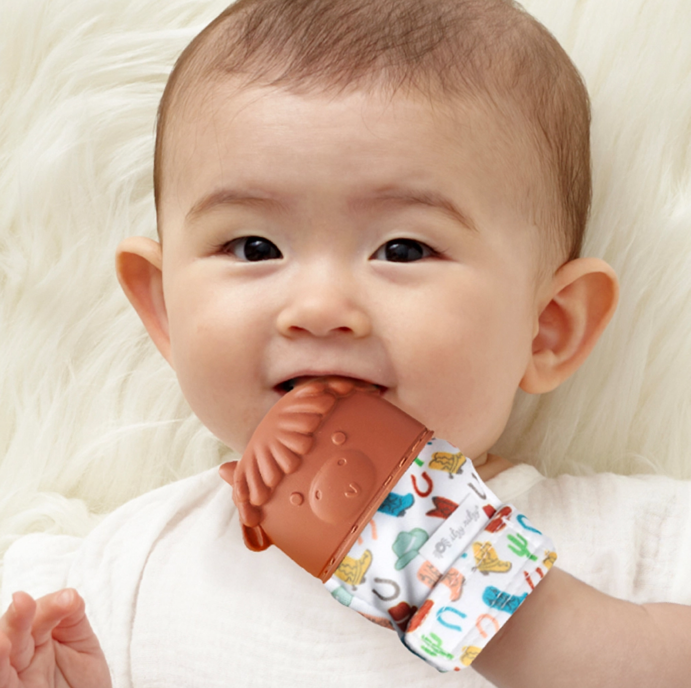 Itzy Mitt™ Silicone Teething Mitt - Highland Cow