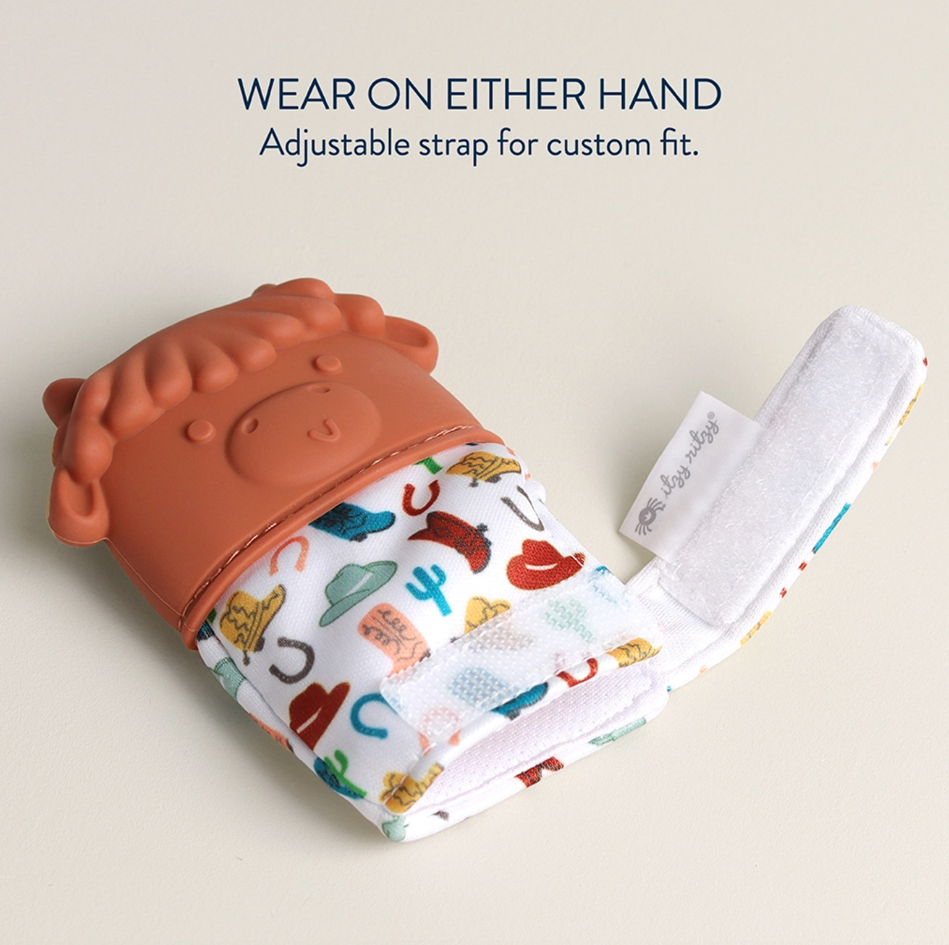 Itzy Mitt™ Silicone Teething Mitt - Highland Cow