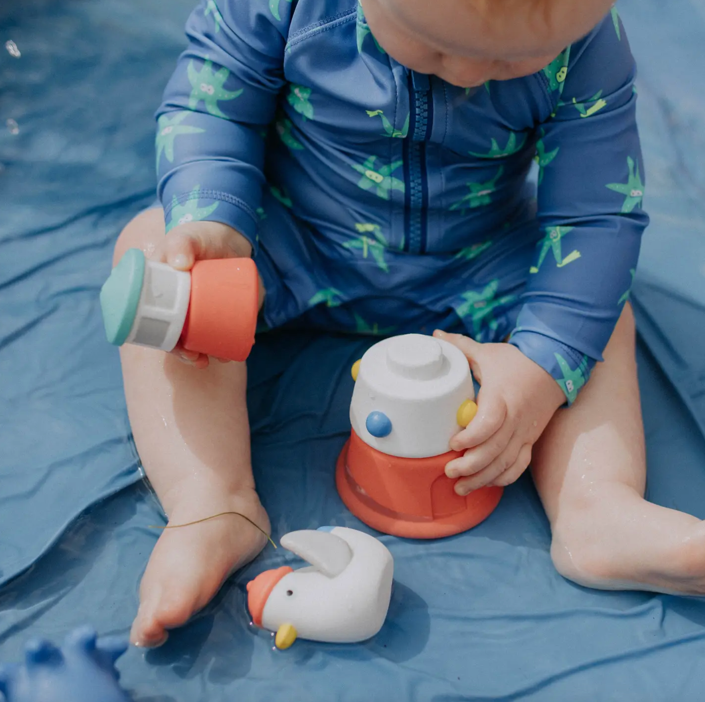 Itzy Stack & Squirt™ Bath + Water Toy