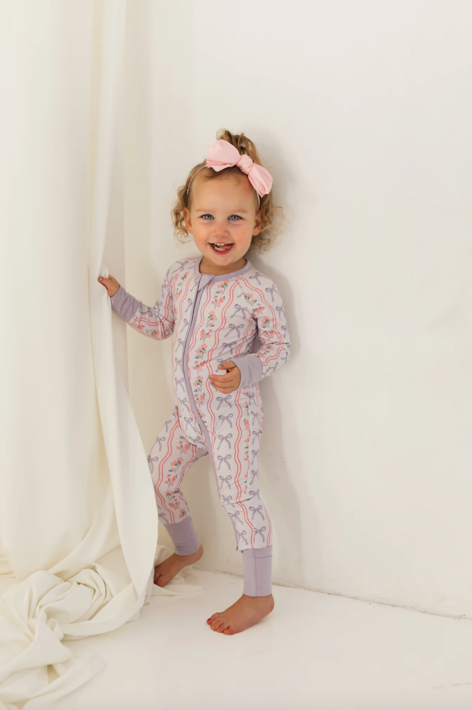 Purple Amelia Bow Zipper Romper